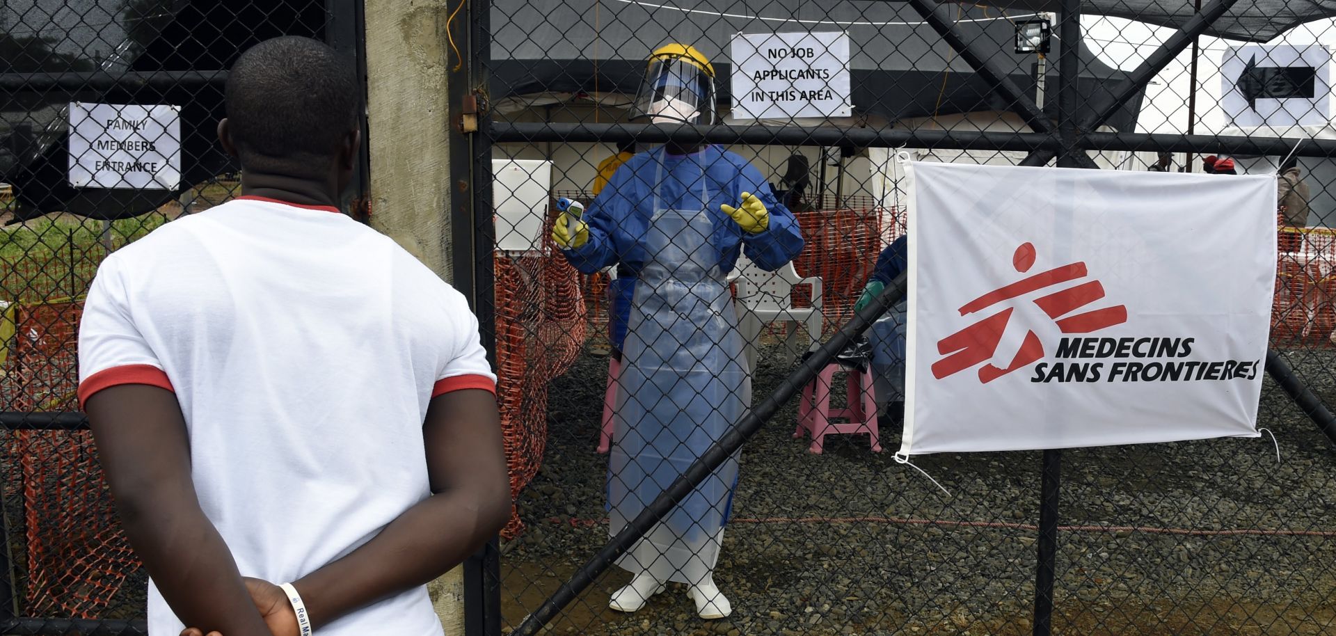 A man outside a medical center staffed by Doctors Without Borders (Medecin sans Frontiere) for people infected with the Ebola virus, Monrovia, Sept. 26, 2014.