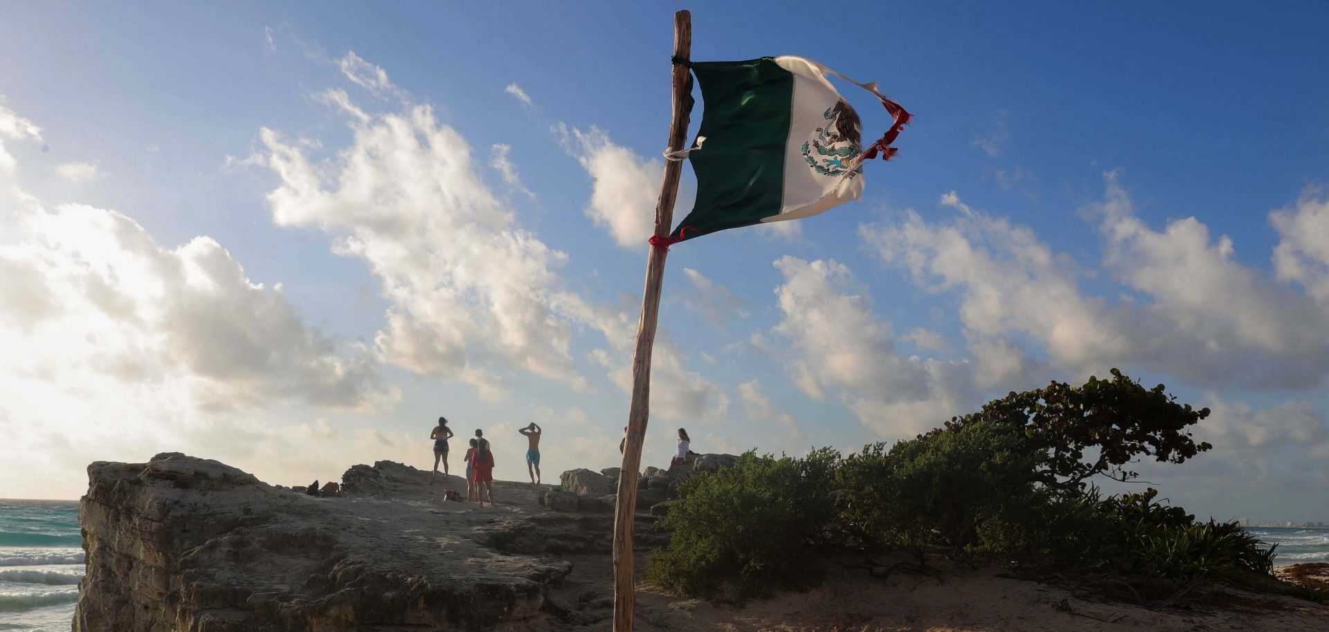 A Mexican flag at a beach Sept. 18, 2019, in Cancun, Mexico.