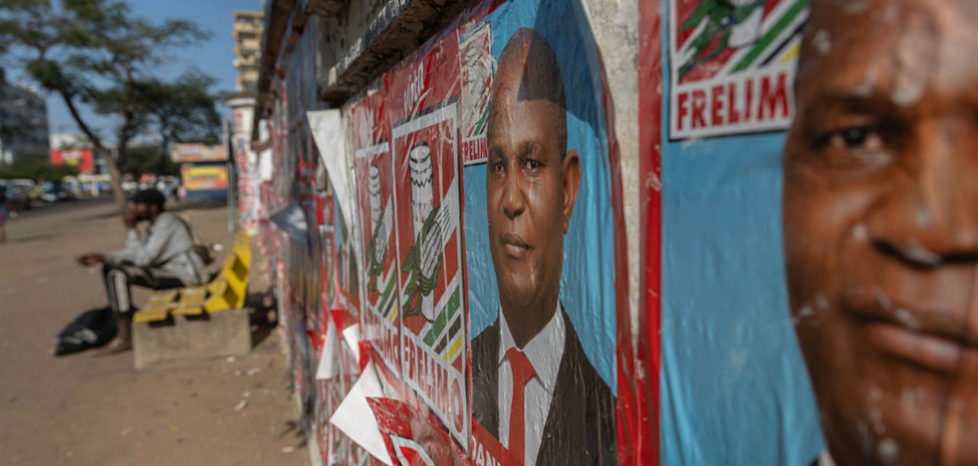 Frelimo electoral posters are plastered on a wall in Maputo, Mozambique, on Aug. 24, 2024, the first day of the presidential campaign season ahead of the general election on Oct. 9, 2024.