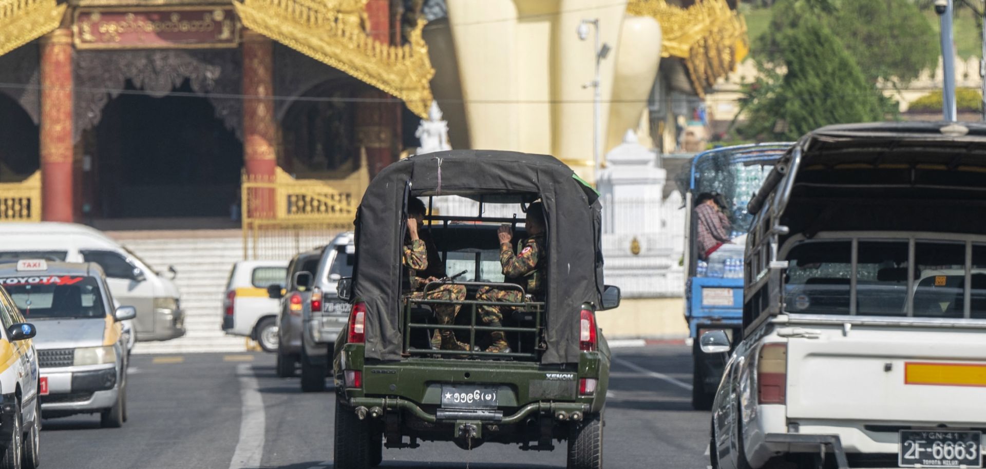 Members of Myanmar's military patrol on a street next to Shwedagon Pagoda during the fourth anniversary of the military coup in Yangon on Feb. 1, 2025. 