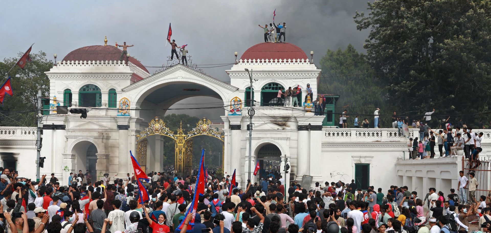 Protesters gather at the Singha Durbar, the main administrative building for the Nepal government, in Kathmandu on Sept. 9, 2025. 