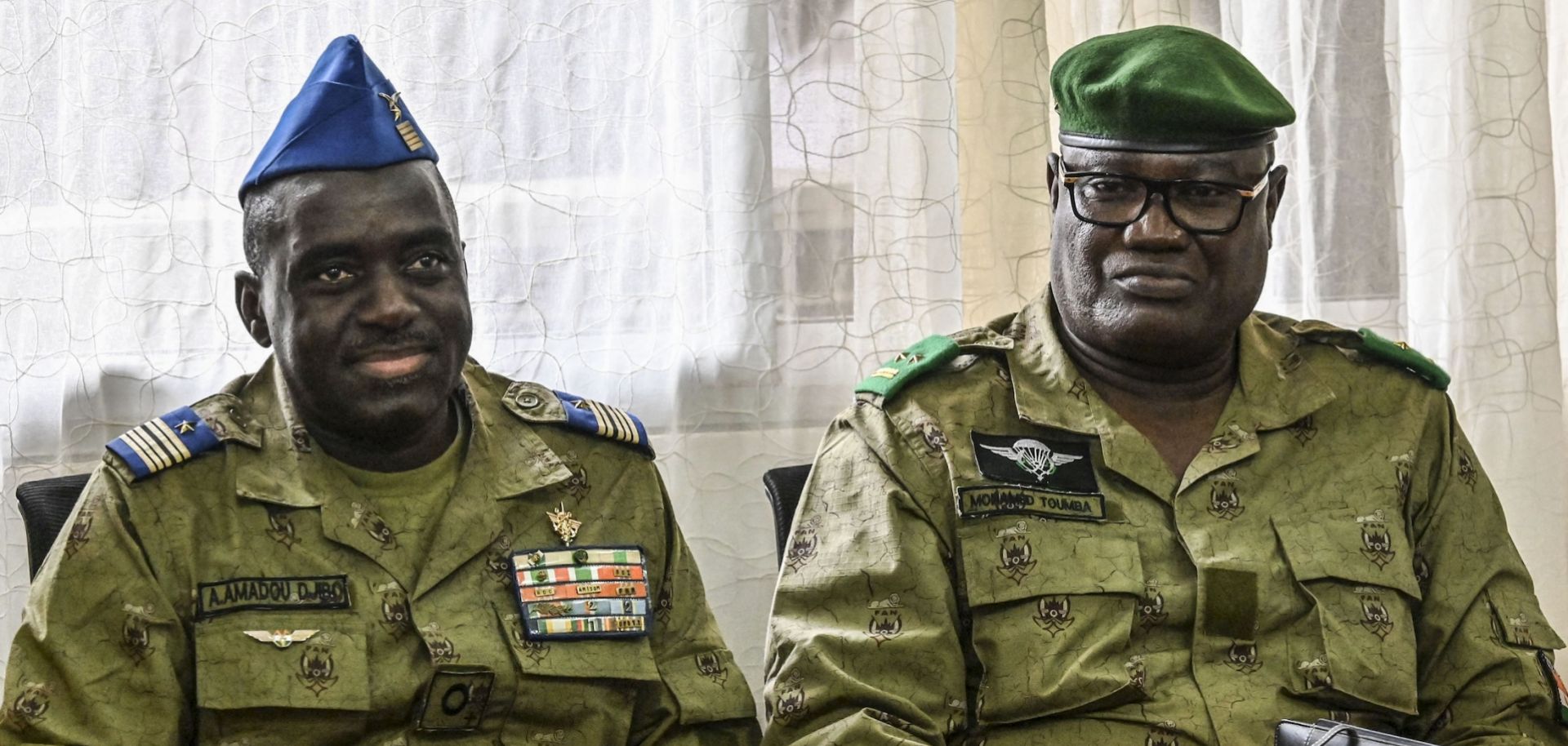 Mohamed Toumba (R), one of the generals who ousted Nigerien President Mohamed Bazoum in July 2023, and military junta spokesperson Amadou Abdramane (L) look on in Niamey, Niger, on Sept. 4, 2023. 