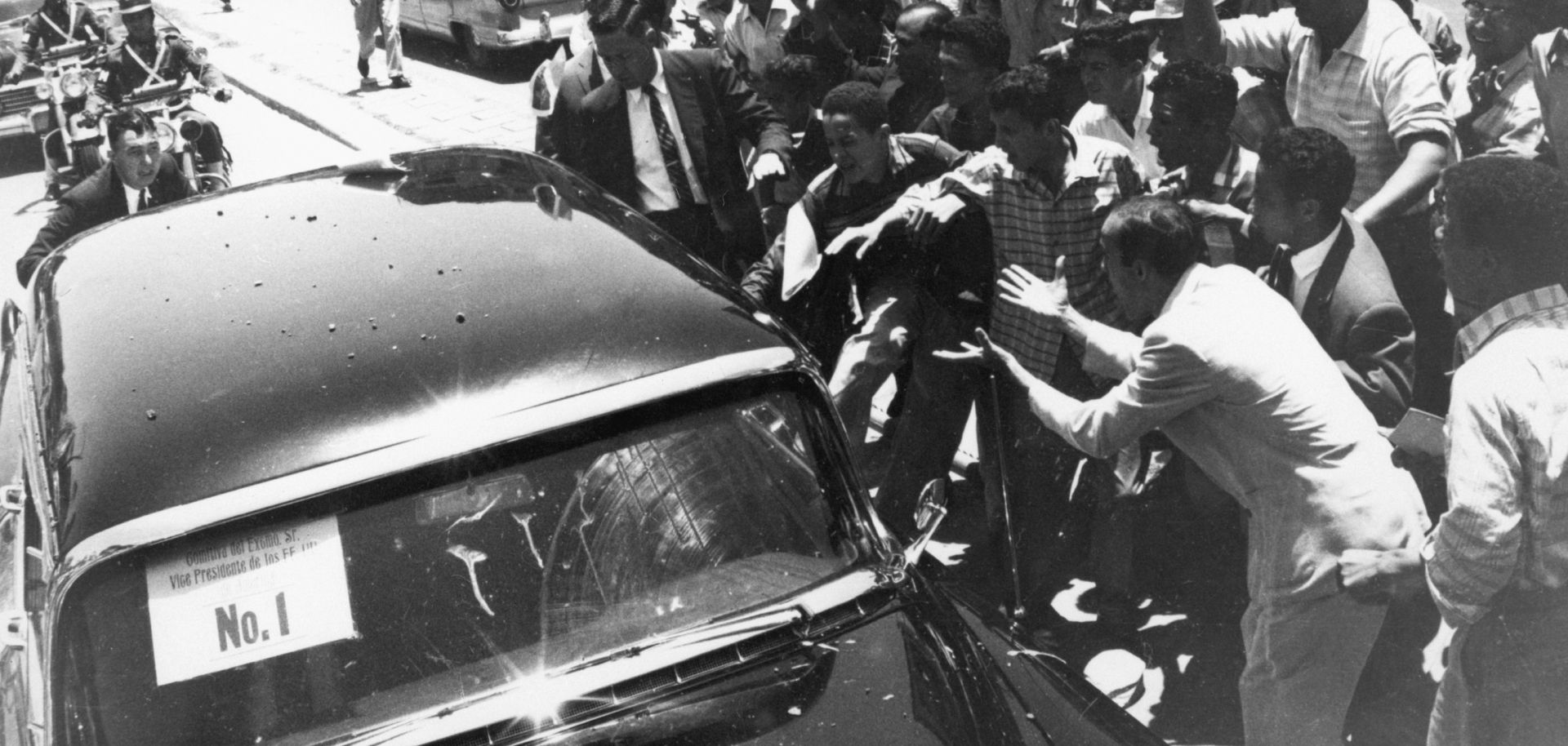 Venezuelans attack the limousine of Vice President Richard Nixon on May 13, 1958, in Caracas.