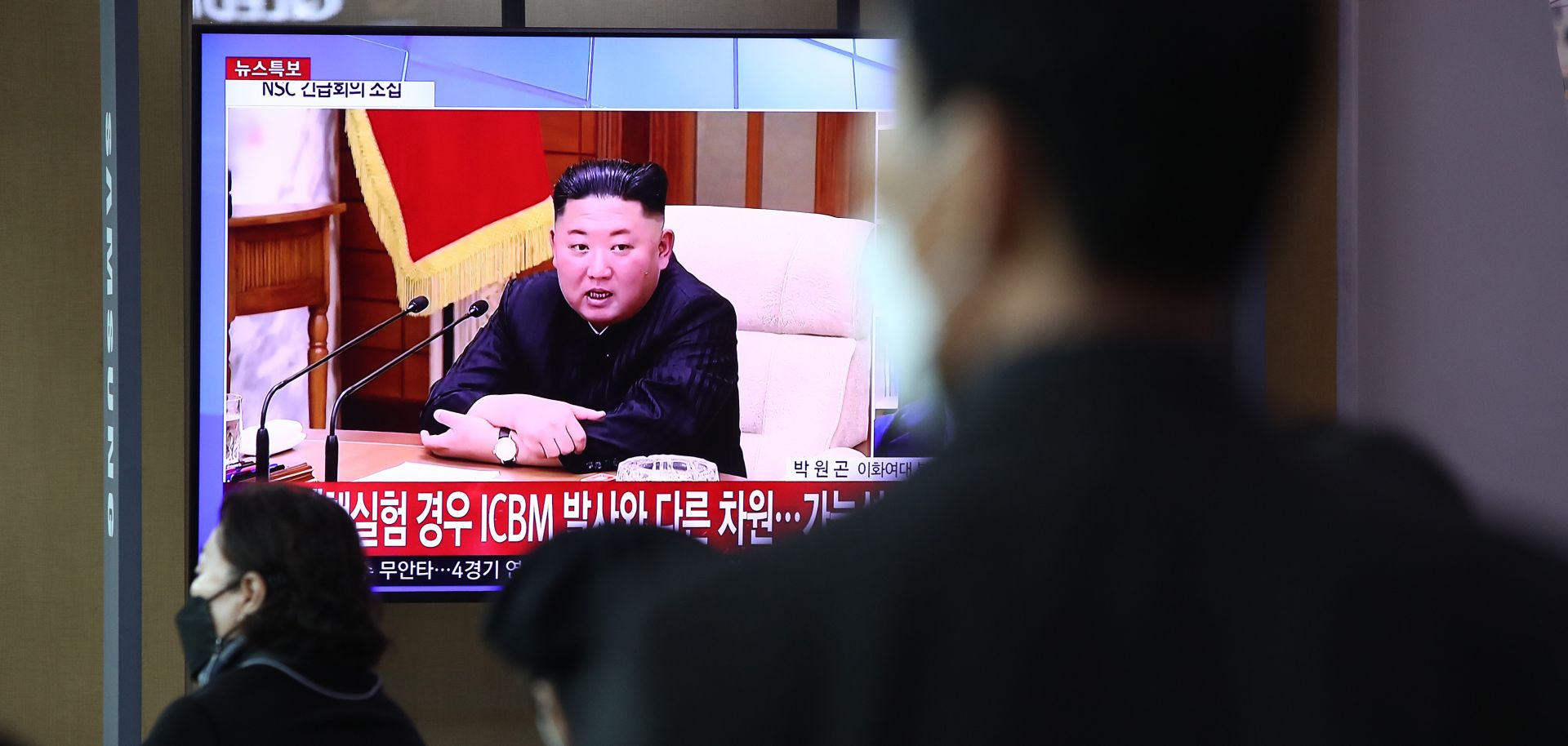 A TV at the Seoul Railway Station on March 24, 2022, in Seoul, South Korea, shows a file image of preparations for a North Korean missile launch.