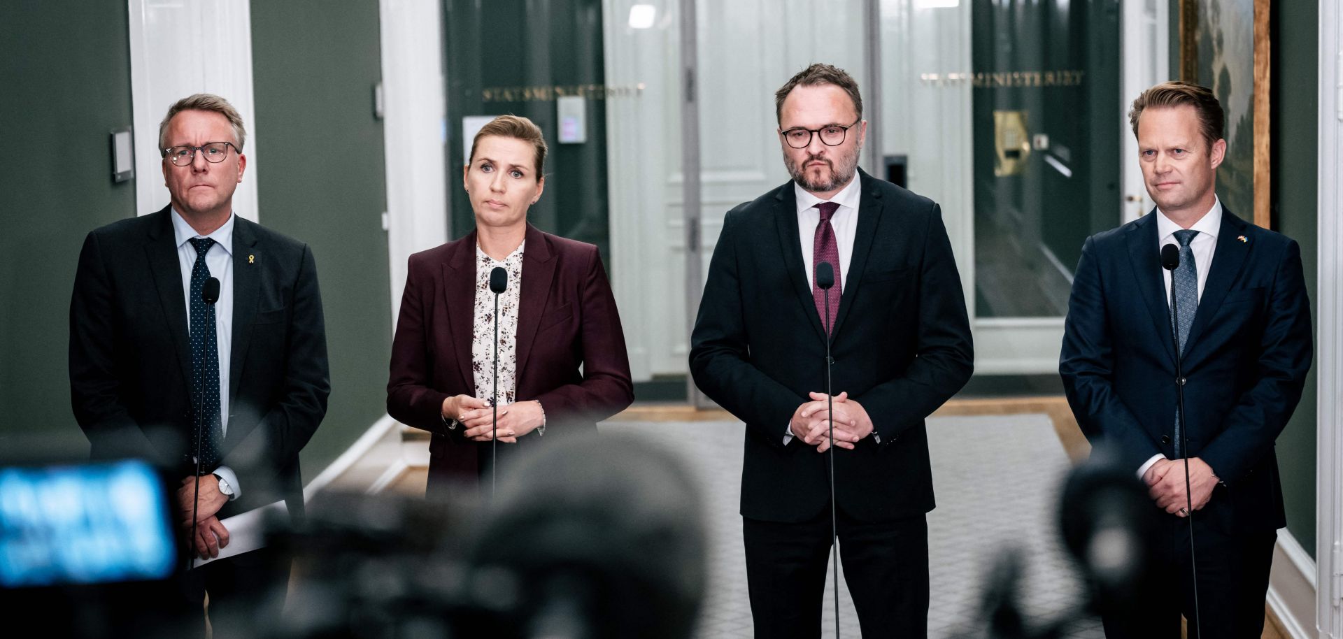 From left to right are Danish Minster of Defense Morten Bodskov, Danish Prime Minister Mette Frederiksen, Danish Climate Minister Dan Joergensen and Danish Minister of Foreign Affairs Jeppe Kofod. The ministers are speaking to the press about three gas leaks on the Nord Stream gas pipelines in the Baltic Sea at a doorstep in Copenhagen on Sept. 27.