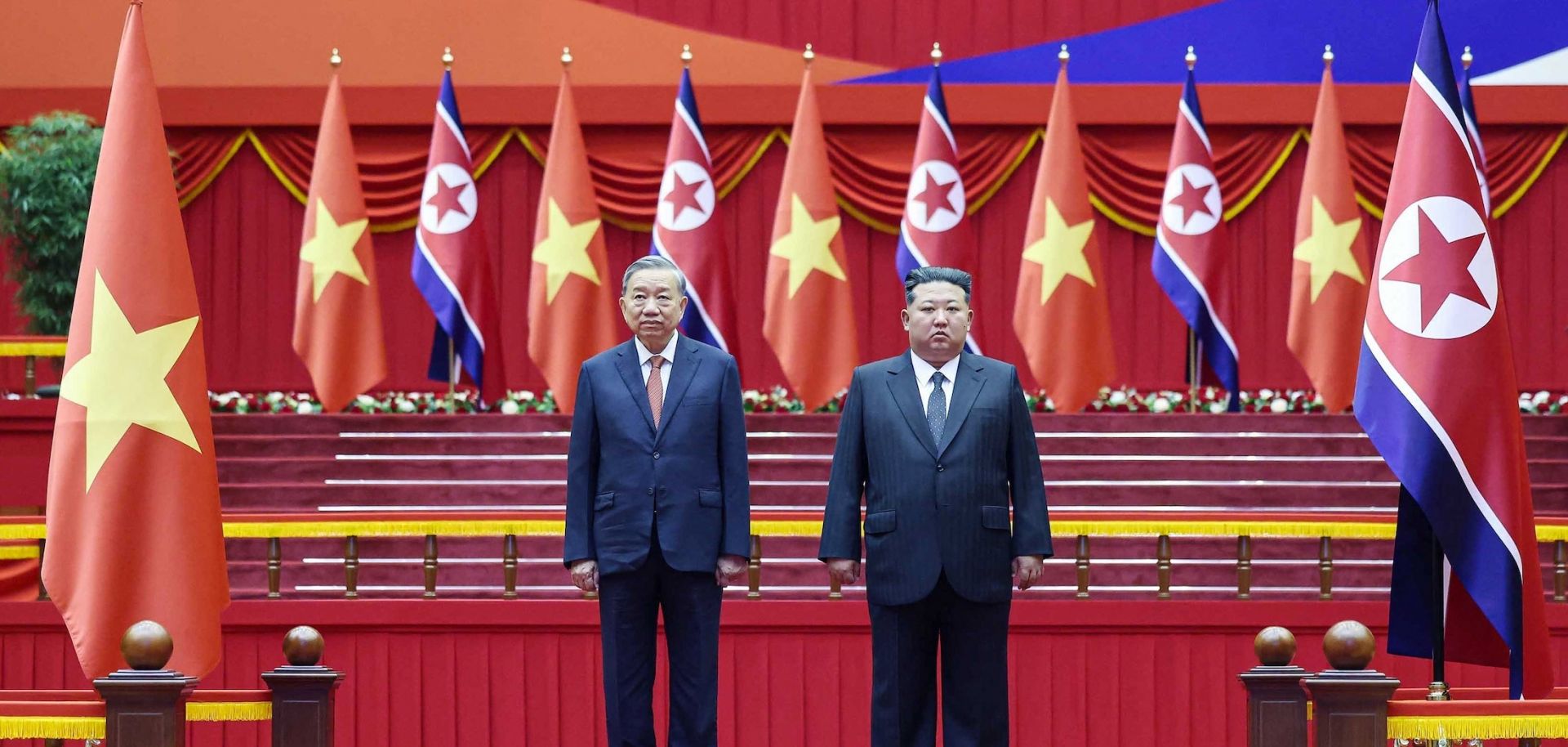 Vietnamese Communist Party General Secretary To Lam (left) and North Korean leader Kim Jong Un participate in a ceremony at the Pyongyang Sports Palace on Oct. 9, 2025, during Lam's three-day official visit to North Korea.