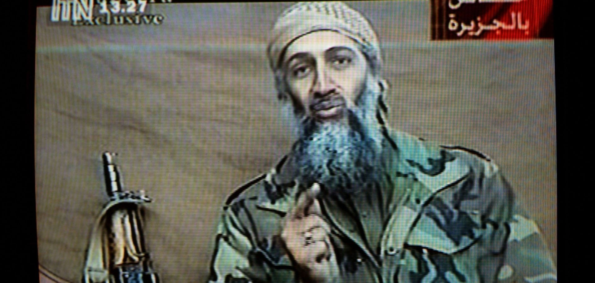 A videotape released by Al-Jazeera TV featuring Osama Bin Laden is broadcast Dec. 27, 2001.