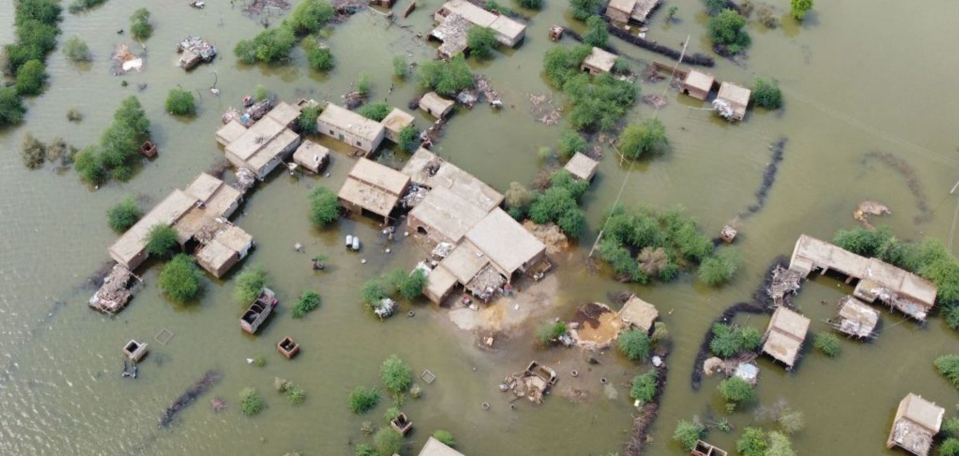A flooded residential area on Aug. 30, 2022, in Dera Allah Yar town after heavy monsoon rains in Jaffarabad district, Balochistan.