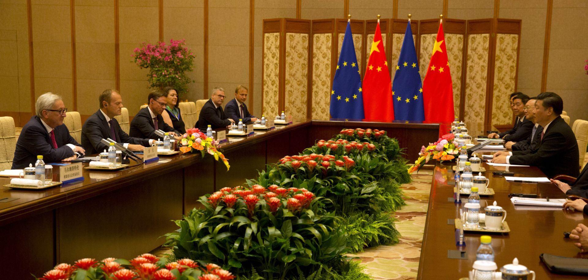 Chinese President Xi Jinping, right, meets with European Commission President Jean-Claude Juncker, left, and European Council President Donald Tusk, second from left, in Beijing on July 16, 2018.