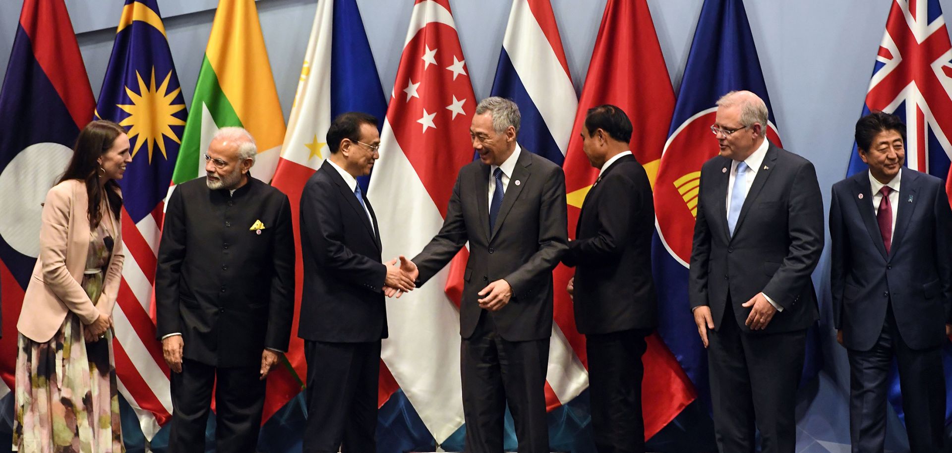 Leaders of the 16 countries negotiating the Regional Comprehensive Economic Partnership assemble for a group photo on Nov. 14, 2018, in Singapore.