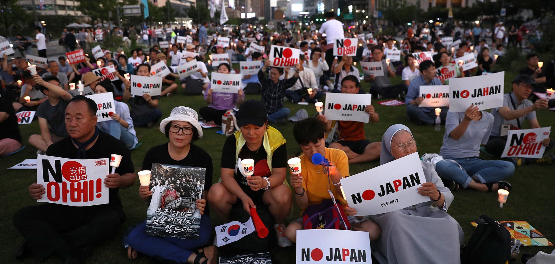 South Koreans participate in a rally to denounce Japan's new trade restrictions and Japanese Prime Minister Shinzo Abe on Aug. 24, 2019, in Seoul. The bilateral relationship between Japan and South Korea has worsened recently amid escalating trade tensions. 