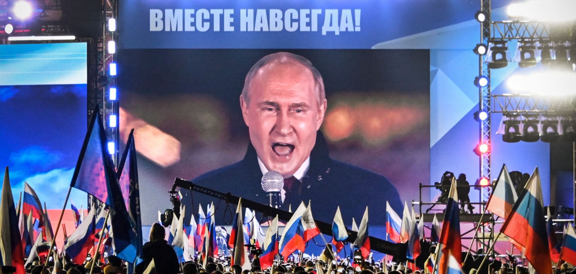 Russian President Vladimir Putin is seen on screen Sept. 30, 2022, at Red Square in Moscow addressing a rally and a concert regarding the annexation of four regions of Ukraine.