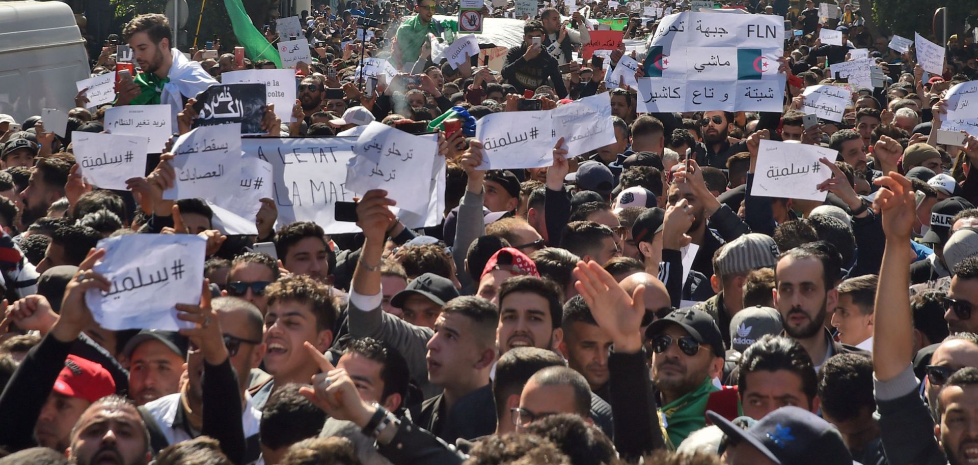 Algerians march in Algiers on March 1, 2019, against President Abdel Aziz Bouteflika's plan to run for a fifth term in April.