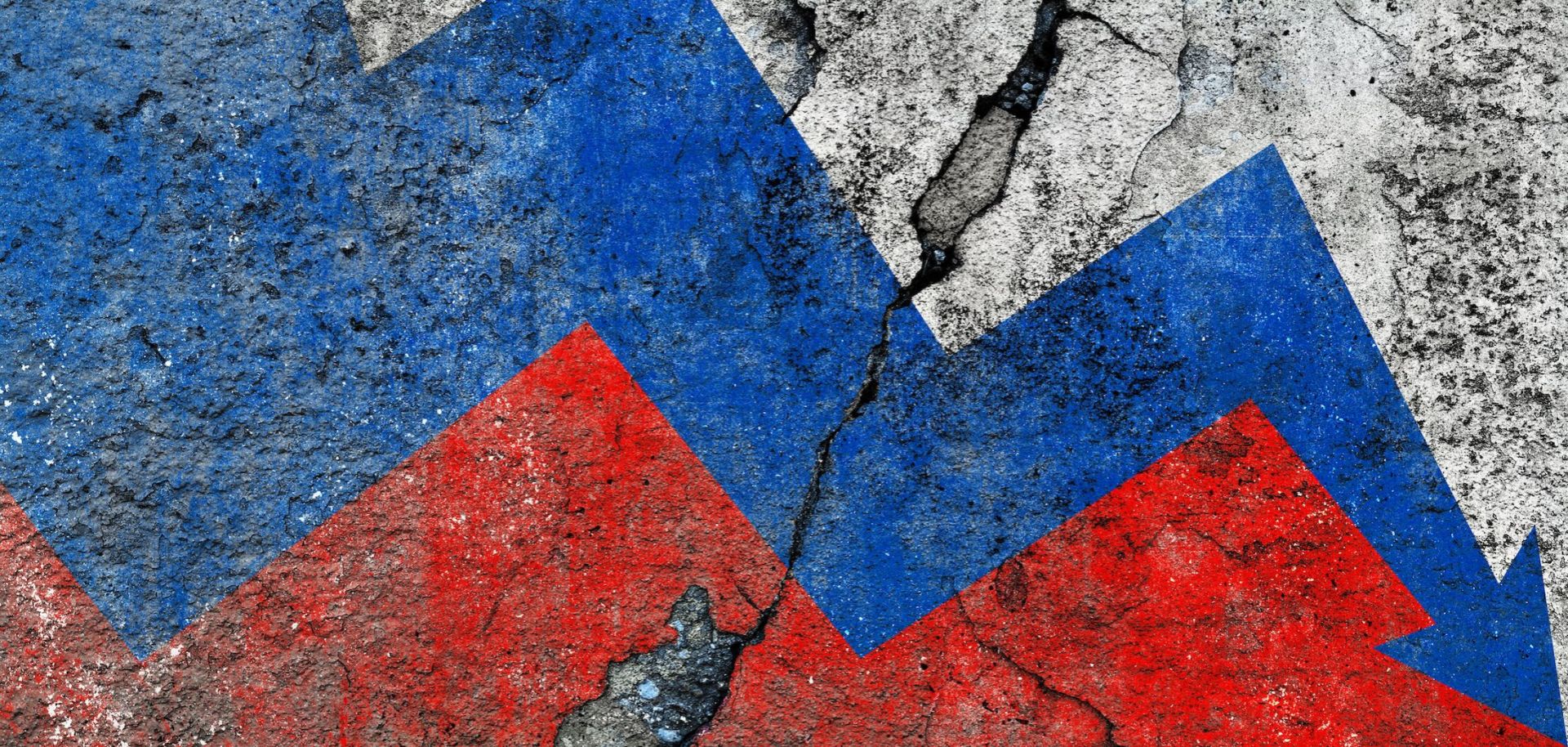 Russian flag on a cracked wall, illustrating an economic decline with a downward arrow. 