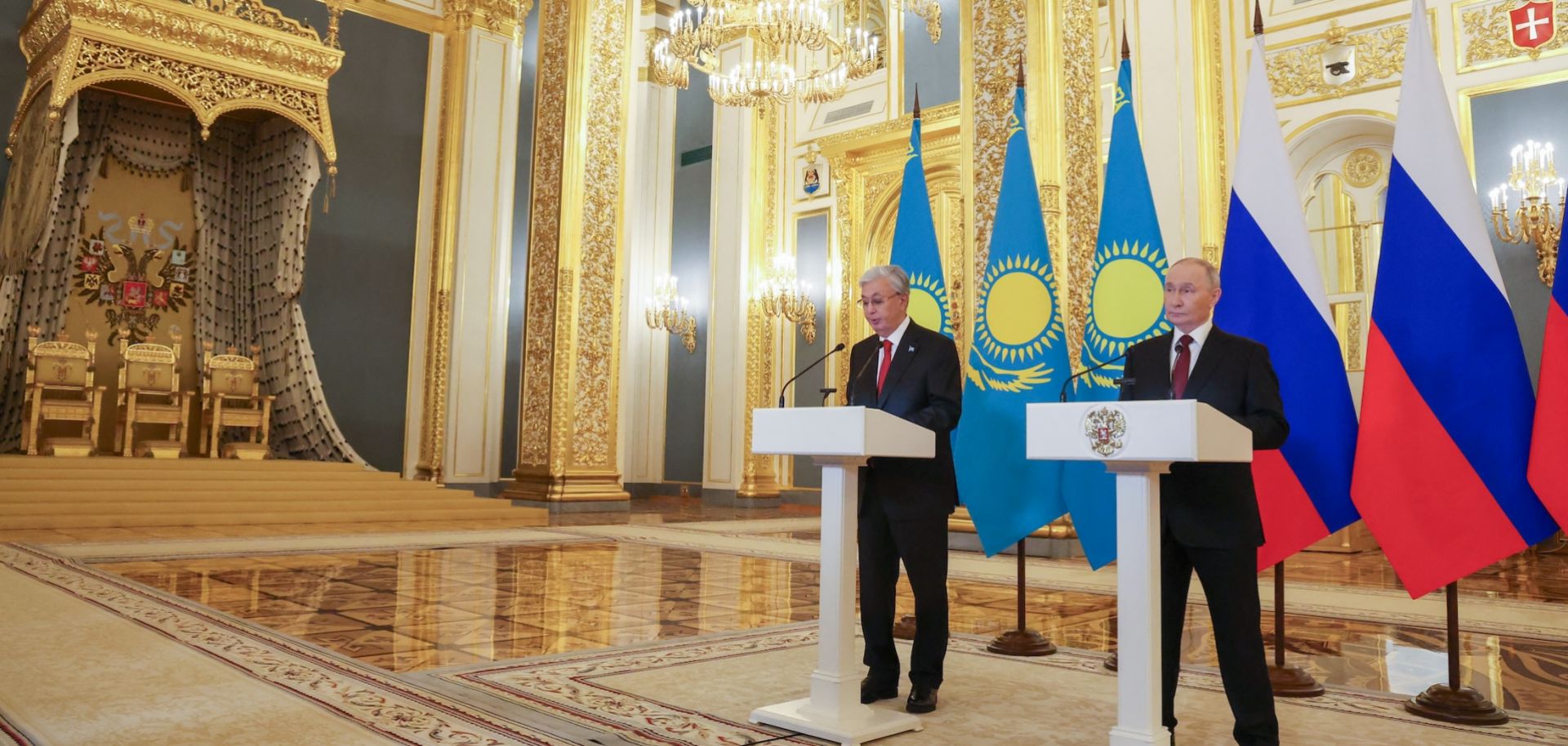 Russian President Vladimir Putin and Kazakh President Kassym-Jomart Tokayev address participants of the 21st Russia-Kazakhstan Interregional Cooperation Forum via a video link during their talks at the Kremlin in Moscow on Nov. 12, 2025. 