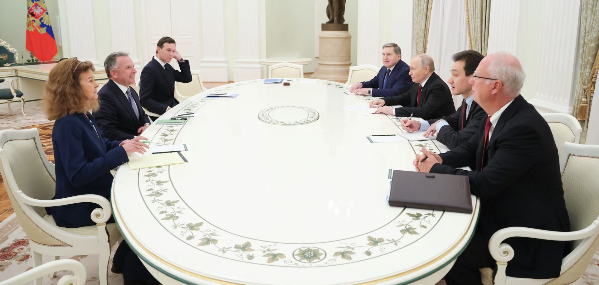 Russia's President Vladimir Putin, accompanied by Kremlin economic envoy Kirill Dmitriev and Kremlin aide Yuri Ushakov, meets with US special envoy Steve Witkoff and US President Donald Trump's son-in-law Jared Kushner at the Kremlin in Moscow on Dec. 2, 2025.