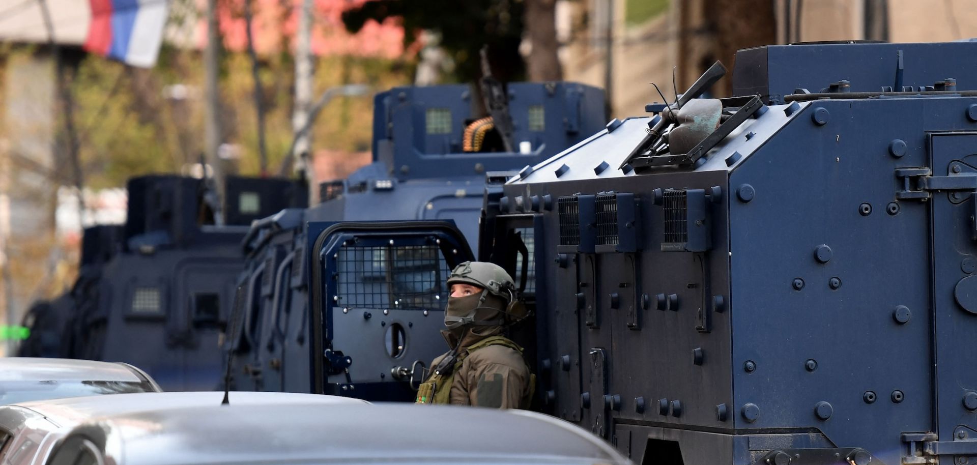 Authorities search a building in Mitrovica, northern Kosovo, on Sept. 29, 2023, after the killing of a police officer.