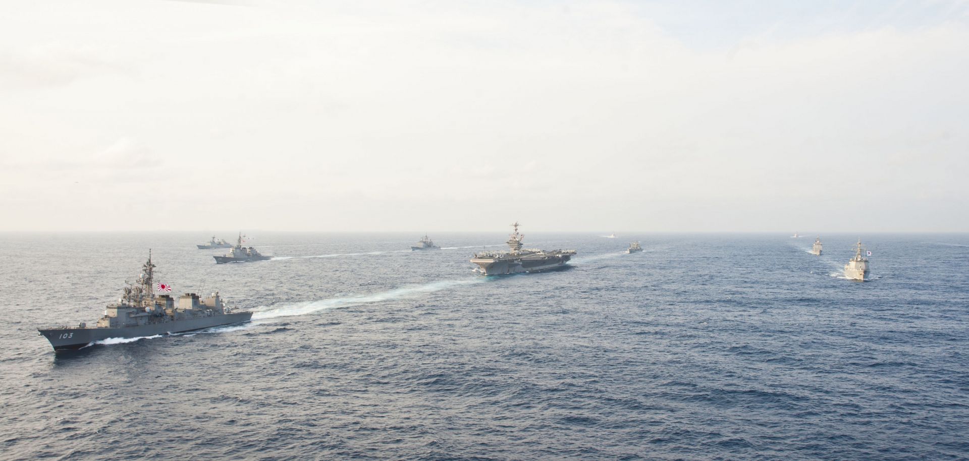 hips from the USS George Washington Carrier Strike Group, the Japanese Maritime Self-Defense Force and the Republic of Korea navy are underway during a trilateral exercise, East China Sea, 2012. 