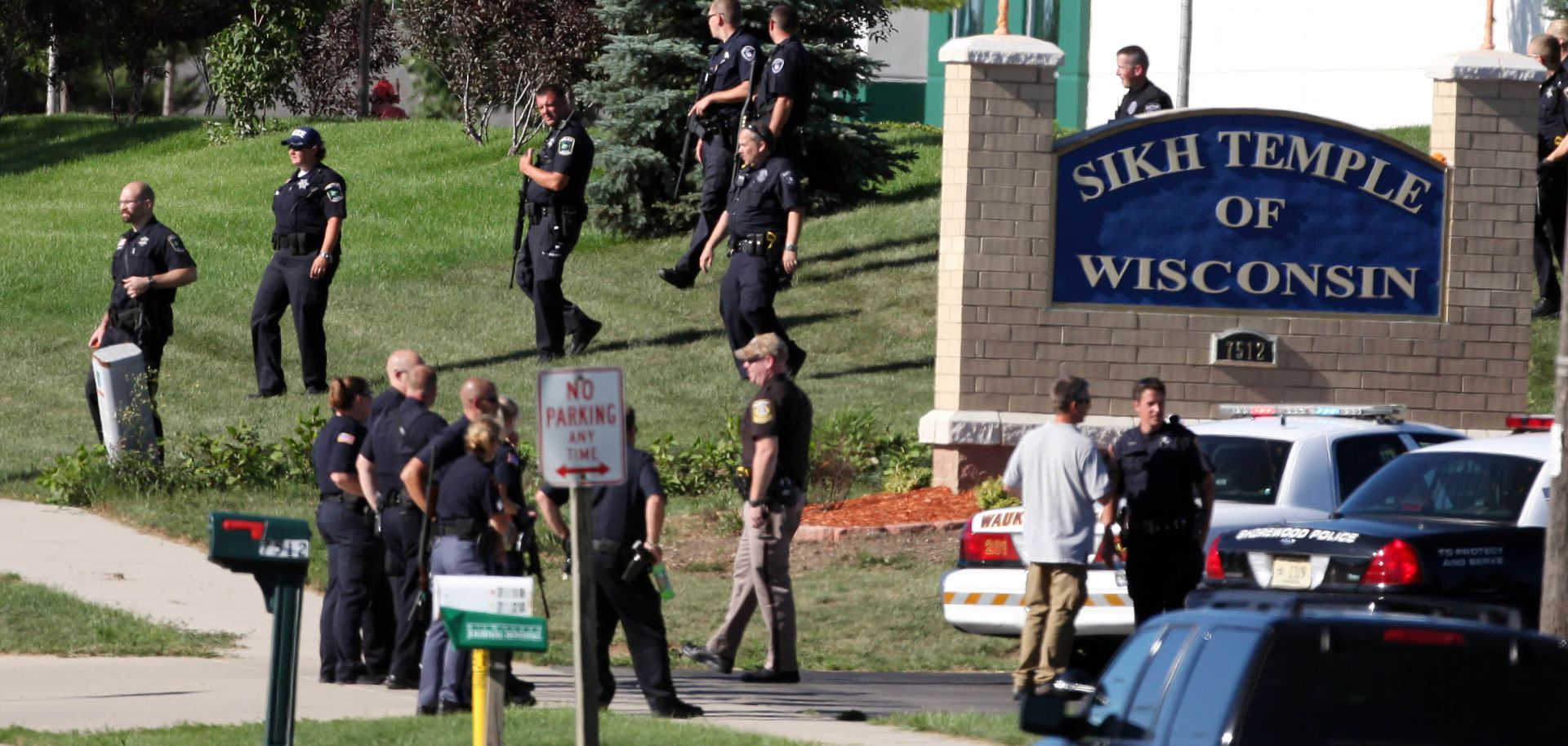 Law enforcement personnel outside the Sikh Temple of Wisconsin after a gunman fired upon people at a service there on Aug. 5, 2012, in Oak Creek, Wisconsin.