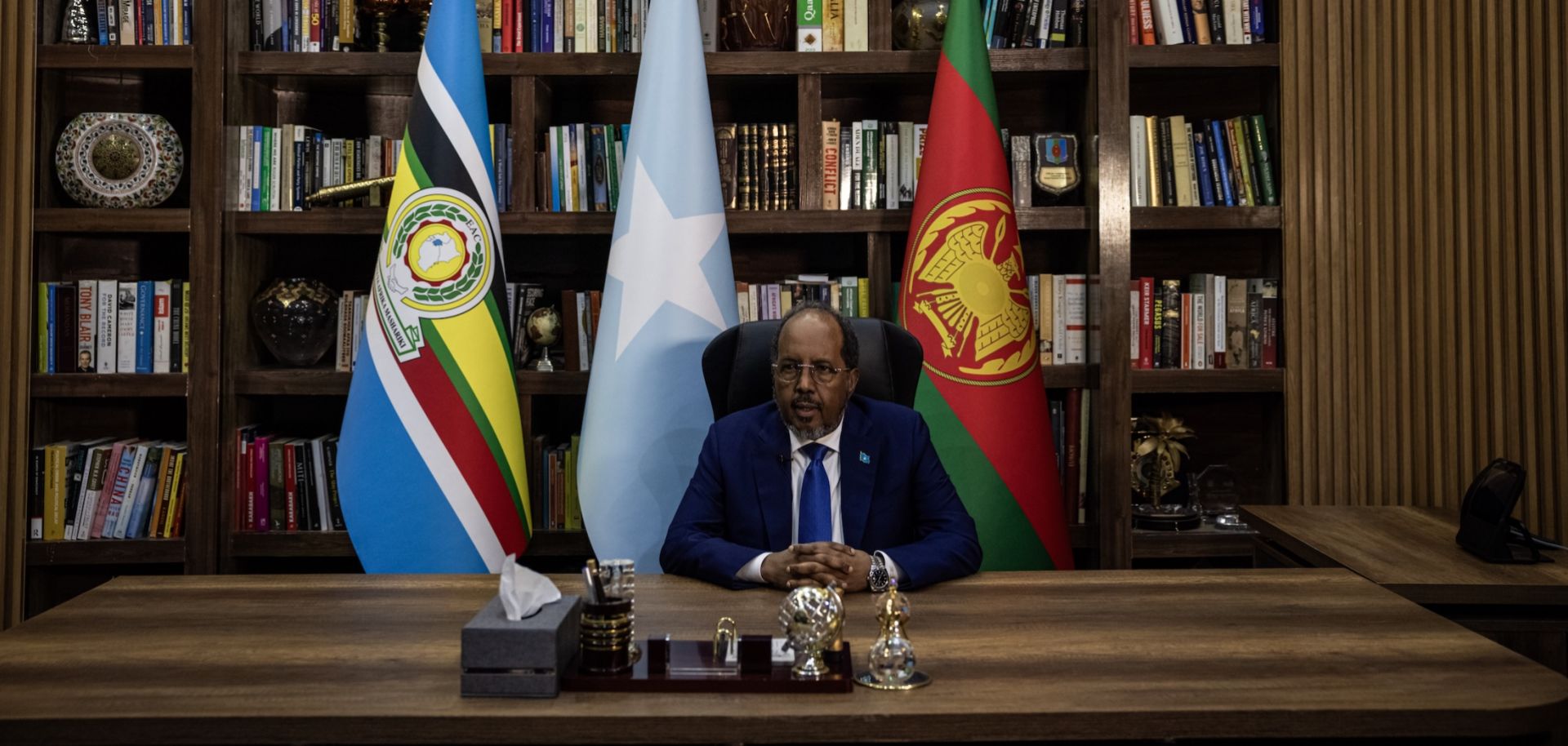 Somali President Hassan Sheikh Mohamud sits in his office as he speaks to journalists at Villa Somalia, the palace and principal workplace of the president, on April 22, 2025, in central Mogadishu, Somalia.