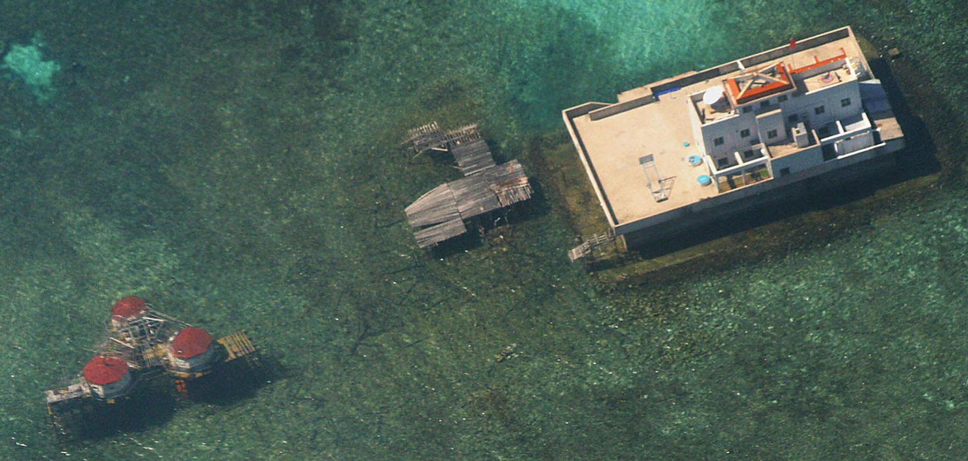 An aerial photograph taken by the Philippine Air Force in November 2003 shows Chinese-built structures near the disputed Spratly Islands in the South China Sea. 