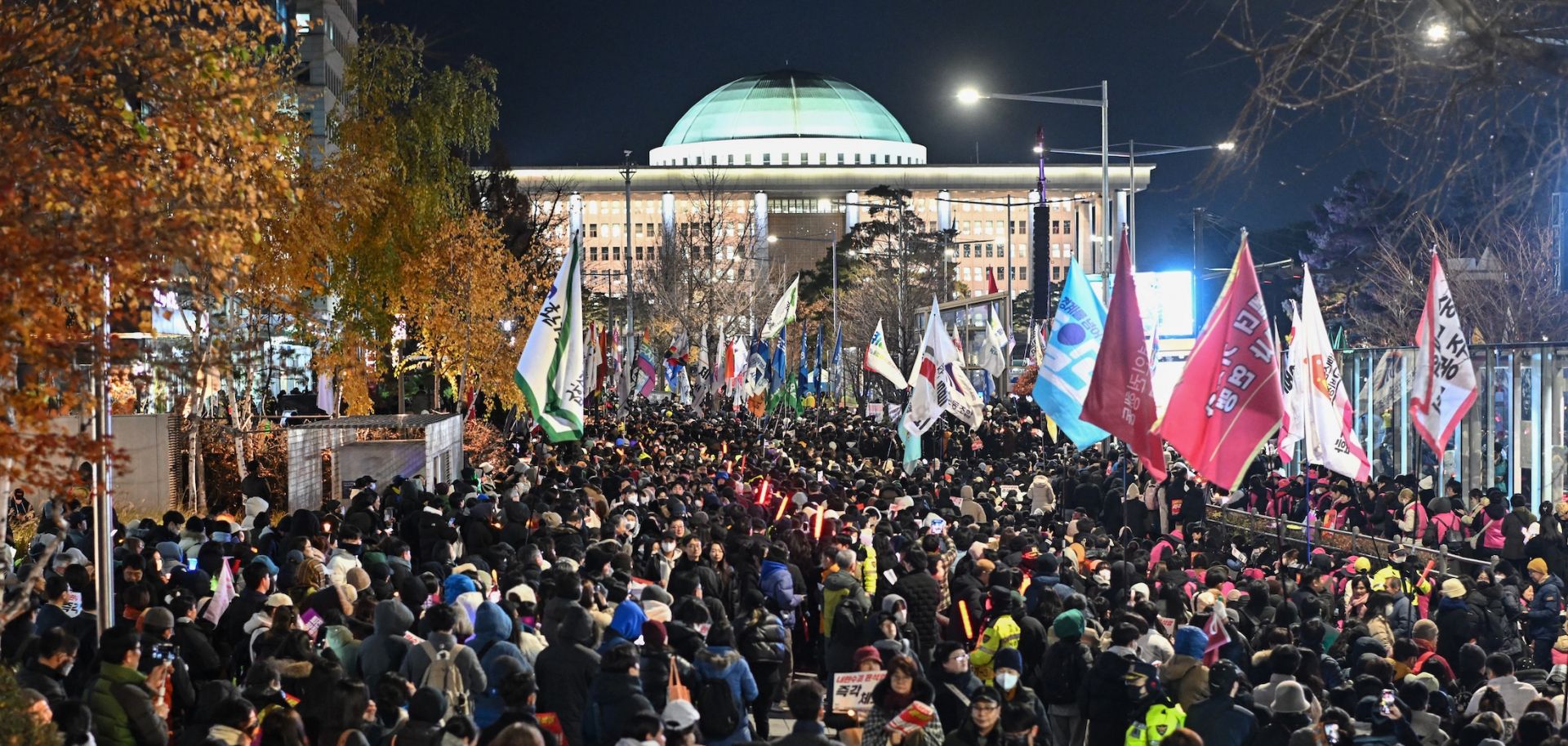 Protesters call for the ouster of South Korean President Yoon Suk Yeol outside the National Assembly in Seoul on Dec. 6, 2024.