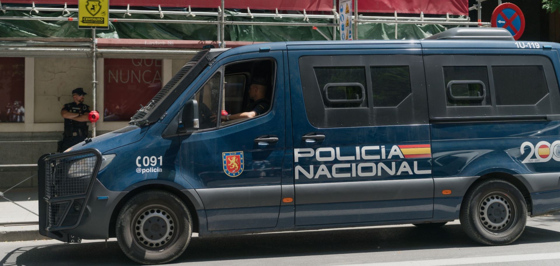 A National Police van is parked in front of the Spanish Socialist Workers' Party headquarters during the Civil Guard's police search on May 27, 2026, in Madrid, Spain. 