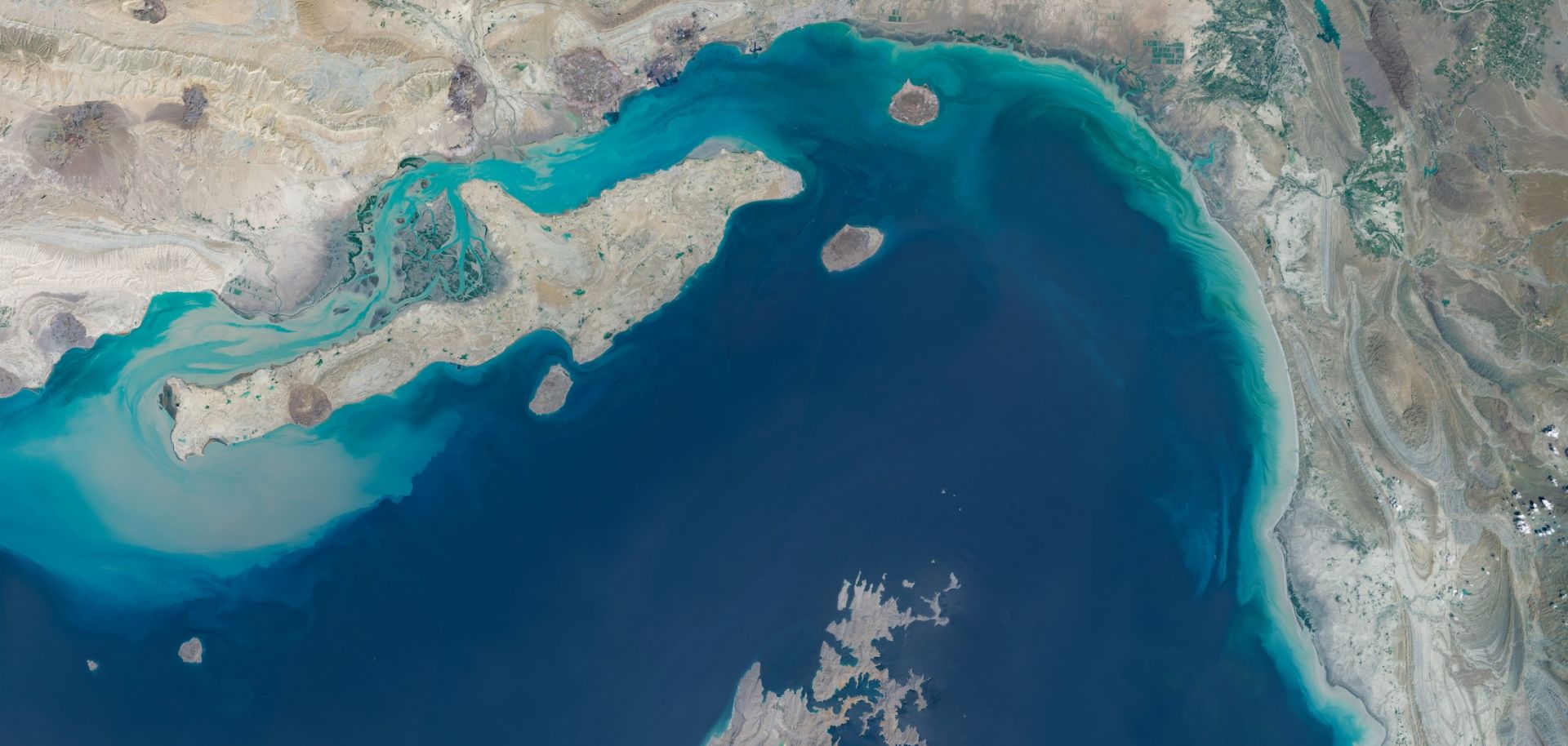 Satellite imagery shows a broad view of the Strait of Hormuz between southern Iran and Oman's Musandam Peninsula on April 7, 2026.