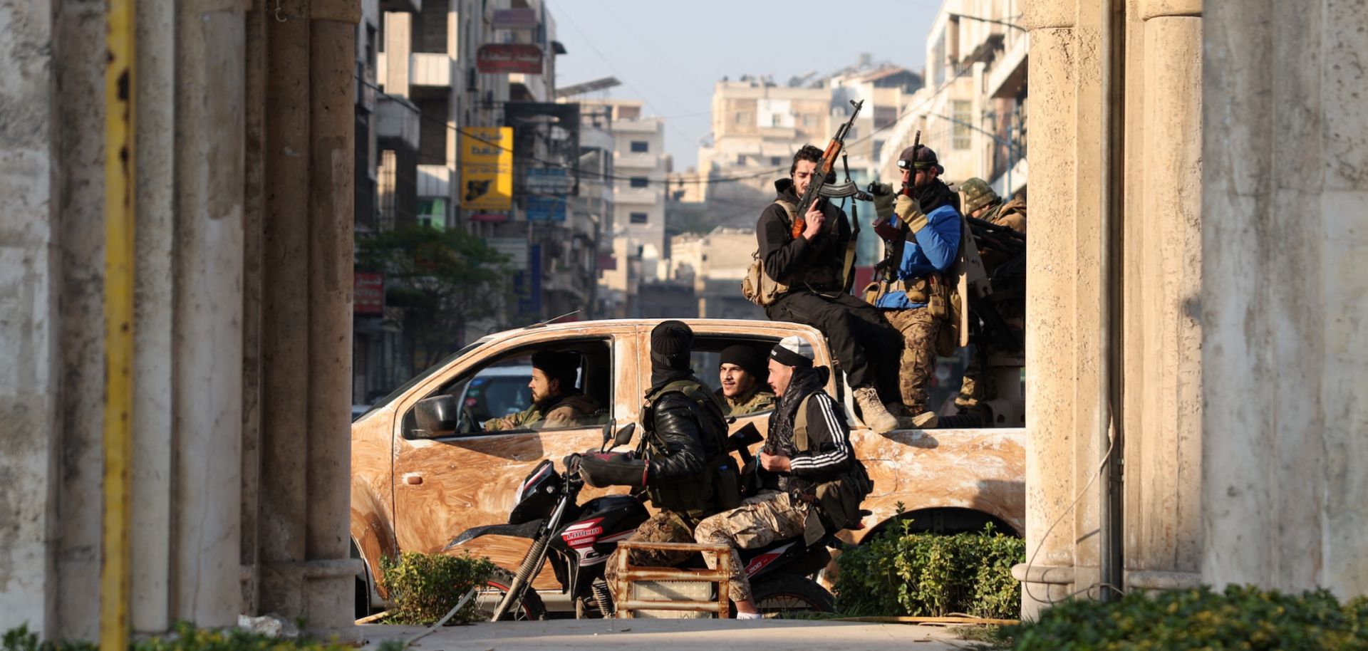 Rebels patrol the streets of Hama after they captured the central Syrian city on Dec. 6, 2024. 