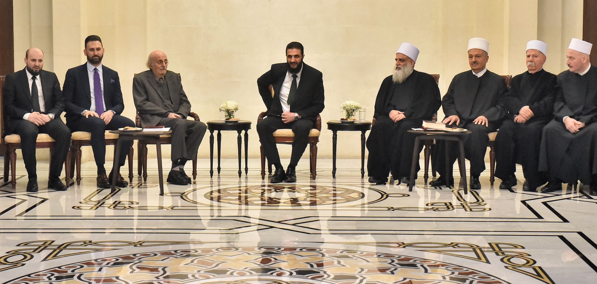 Walid Jumblatt, the Druze former leader of Lebanon's Progressive Socialist Party, and his son and current party head, Taymur Jumblatt, meet with Syrian leader Ahmed al-Sharaa, interim prime minister Mohammad al-Bashir and other Druze leaders during a Dec. 22 visit to Damascus, Syria.