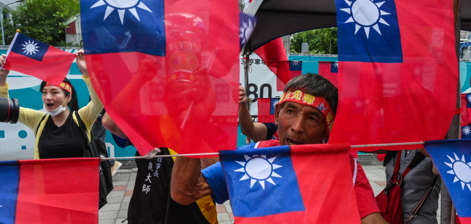 Supporters of the opposition Kuomintang (KMT) party rally outside the KMT's headquarters in Taipei, Taiwan, ahead of the party's expected announcement of its 2024 presidential candidate on May 17, 2023. 