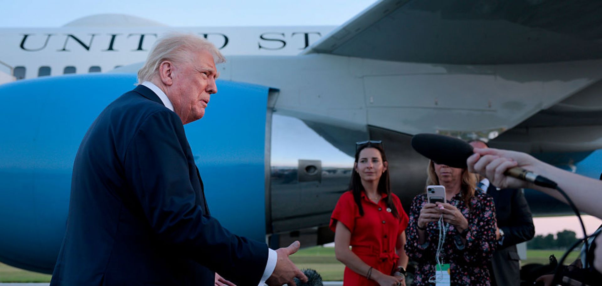 U.S. President Donald Trump speaks to reporters near Air Force One at the airport in Allentown, Pennsylvania, on Aug. 3, 2025. Trump answered questions about his upcoming meeting with Russian President Vladimir Putin, among other topics. 