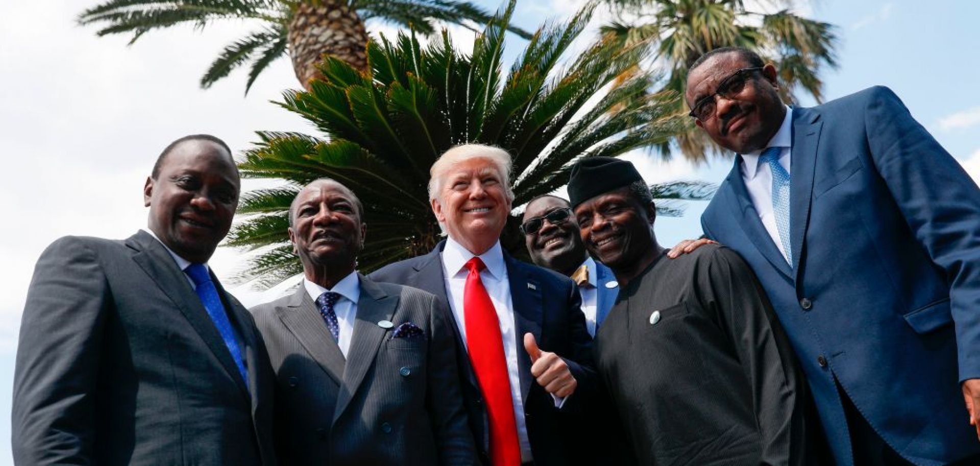 Kenya's President Uhuru Kenyatta, Guinea's President Alpha Conde, US President Donald Trump, African Development Bank President Akinwumi Adesina, Vice President of Nigeria Yemi Osinbajo and Ethiopian Prime Minister Hailemariam Desalegn pose on May 27, 2017 in Taormina, Sicily.