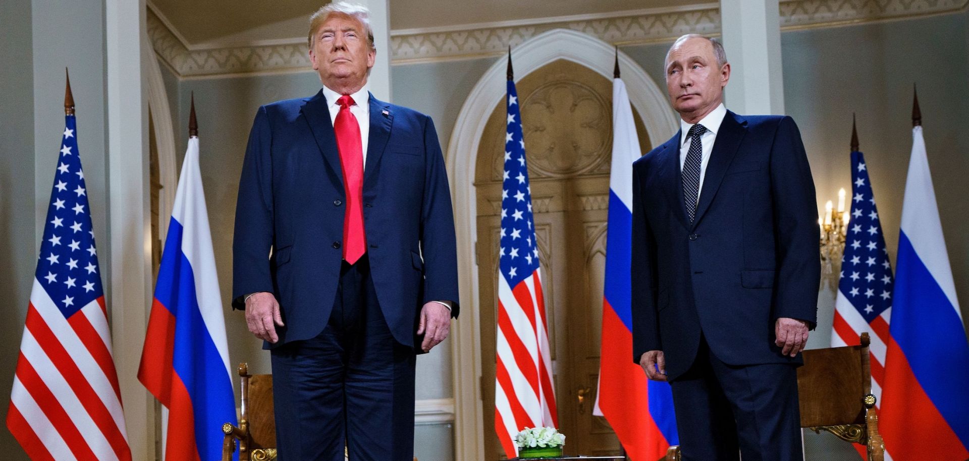 U.S. President Donald Trump (left) and Russian President Vladimir Putin pose ahead of a meeting in Helsinki, Finland, on July 16, 2018. 