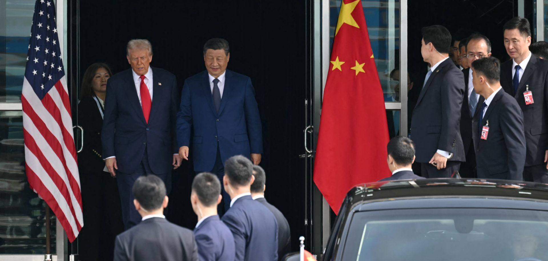 U.S. President Donald Trump (L) and China's President Xi Jinping leave after their talks at the Gimhae Air Base, in Busan, South Korea, on Oct. 30, 2025. 
