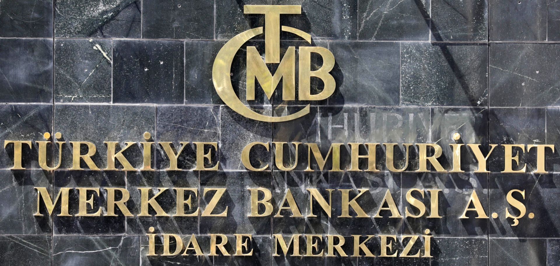 A picture taken on Aug. 14, 2018, shows the logo of Turkey's central bank at the entrance of its headquarters in Ankara. 