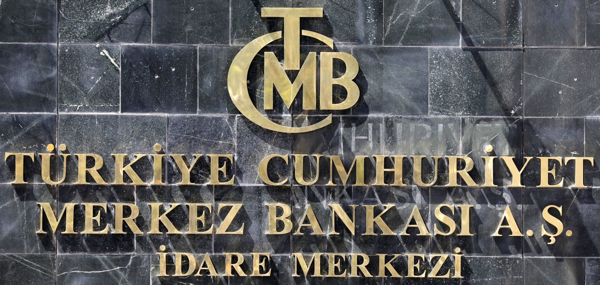 A picture taken on Aug. 14, 2018, shows the logo of Turkey's central bank at the entrance of its headquarters in Ankara. 