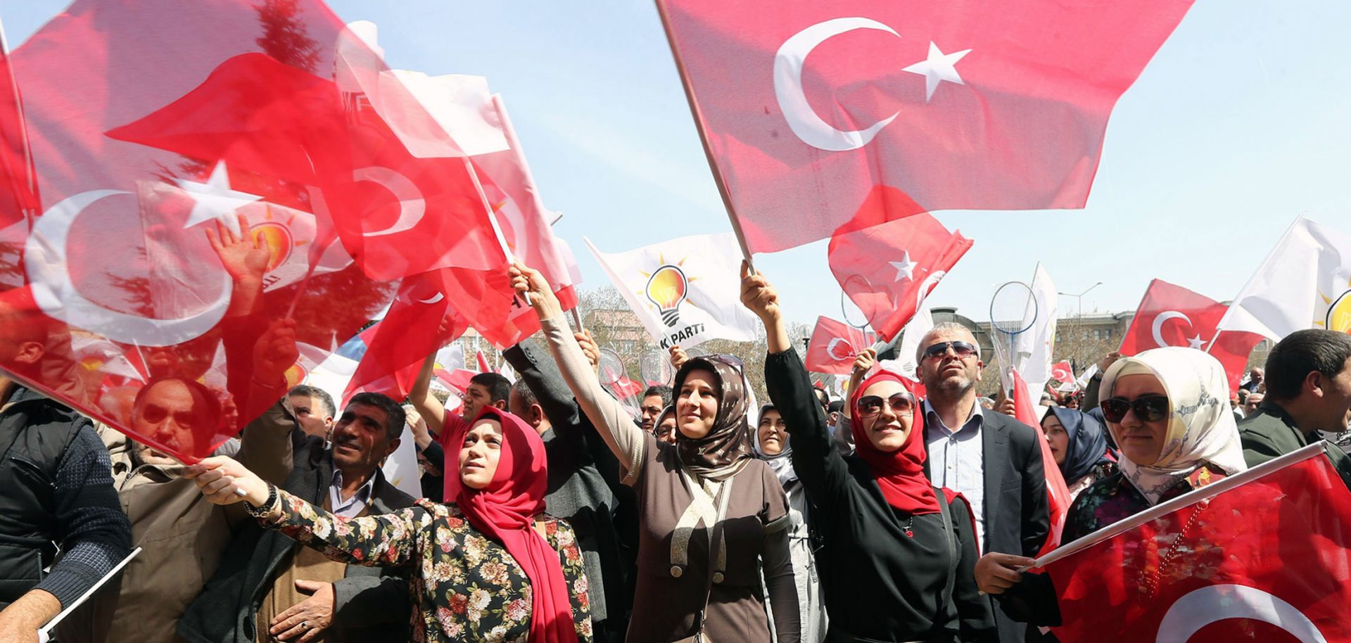 Supporters cheer for Ankara Mayor Melih Gokcek, a member of Turkey's ruling Justice and Development Party, on April 5, 2014.