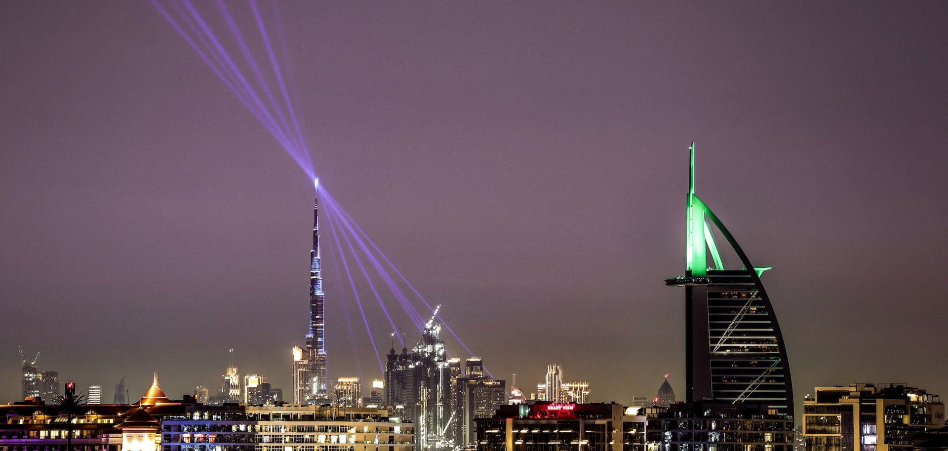 The Burj Khalifa skyscraper (L) and the Burj al-Arab hotel (R) on March 11 in Dubai, United Arab Emirates.