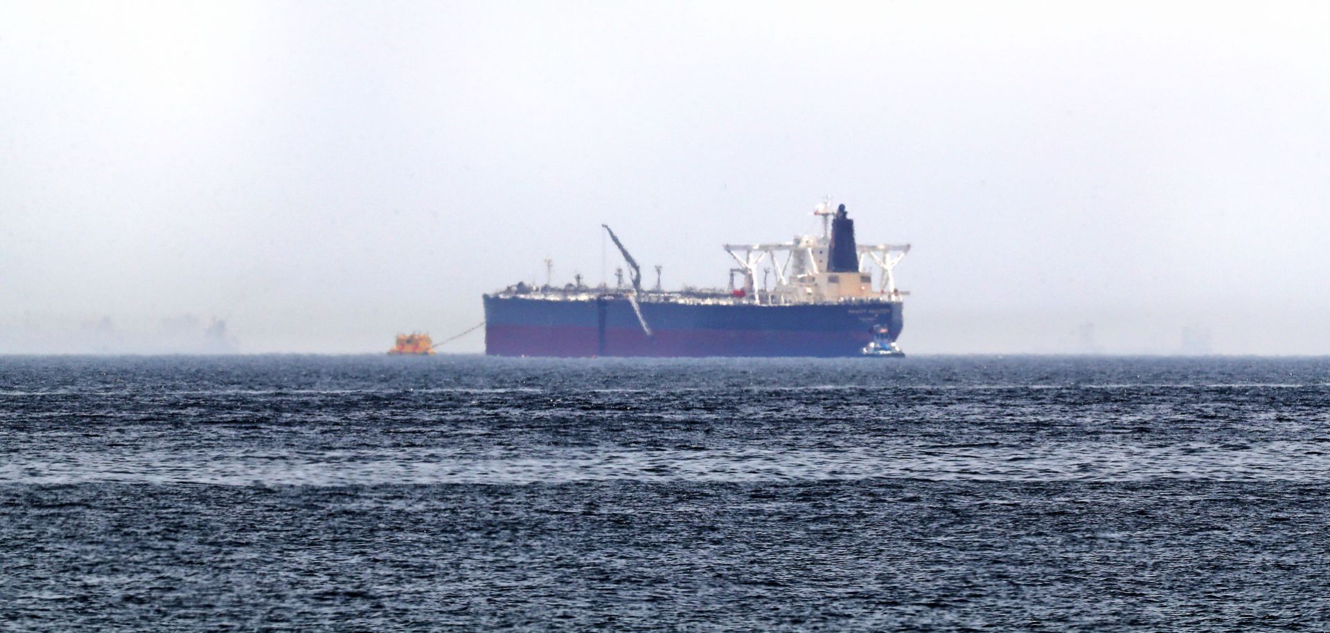 A picture taken on May 13, 2019, shows the crude oil tanker Amjad, one of two Saudi tankers that were reportedly damaged in mysterious "sabotage attacks," off the coast of the Gulf emirate of Fujairah.