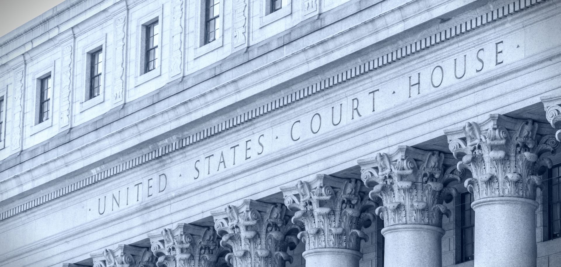 A U.S. courthouse facade with columns in lower Manhattan, New York.