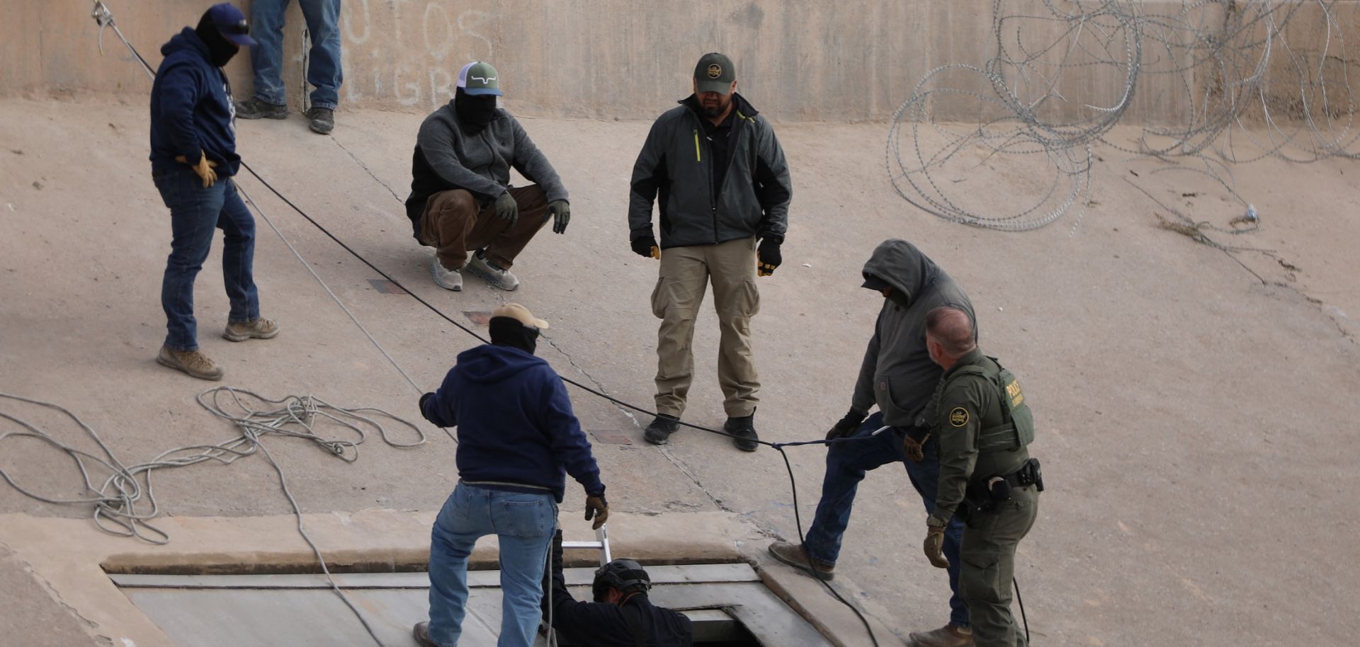 Migrants from Mexico and Guatemala are apprehended by U.S. Customs and Border Patrol officers after crossing a section of the U.S.-Mexico border in Ruby, Arizona, on Jan. 4, 2025.