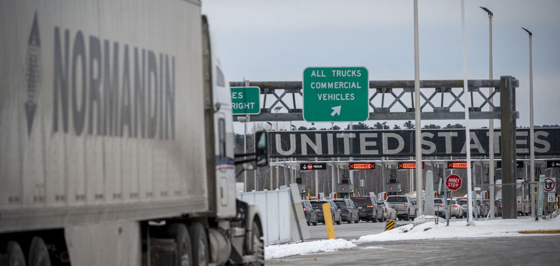 A truck drives toward the Canada-U.S. border crossing in Blackpool, Canada, on Feb. 2, 2025.