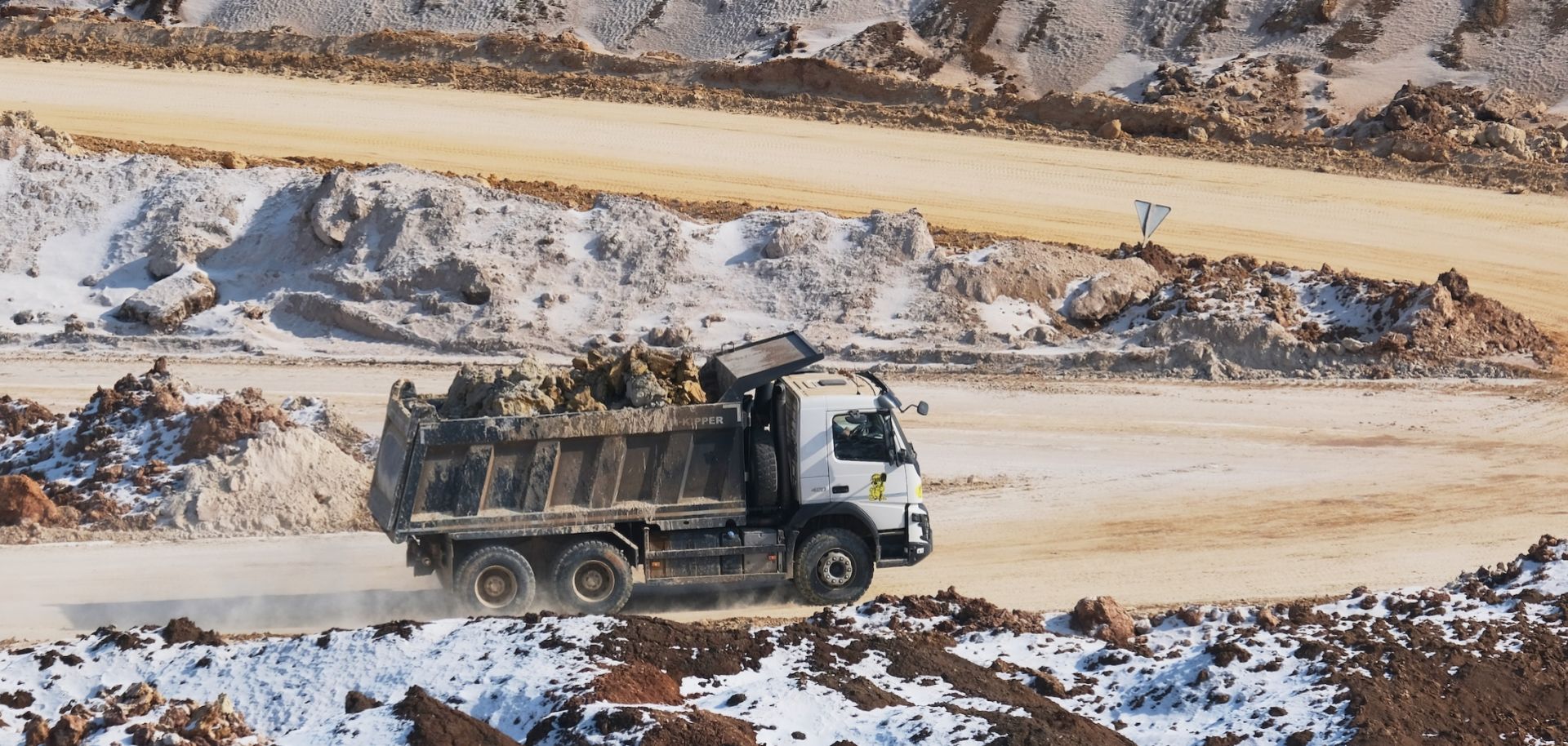 Minerals are loaded onto trucks at an open-pit mine in Ukraine's Donetsk region, near the frontline of the war with Russia, on Feb. 26, 2025.