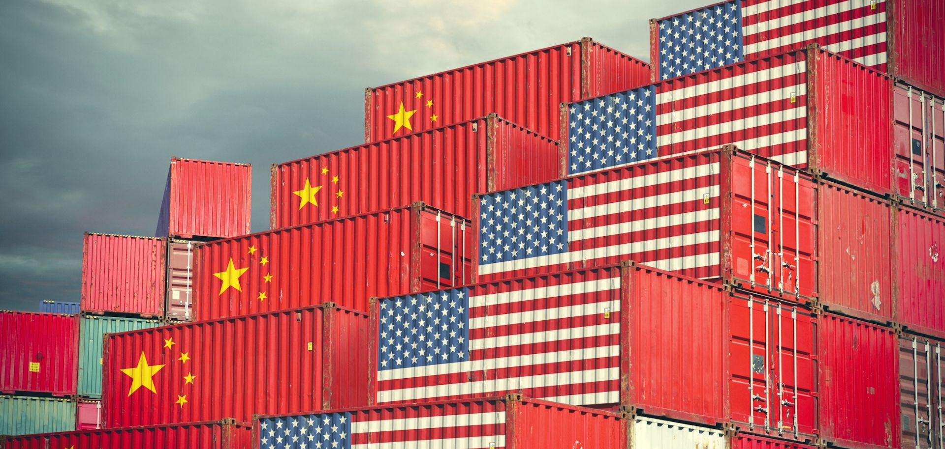 Cargo containers painted with Chinese and U.S. flags.