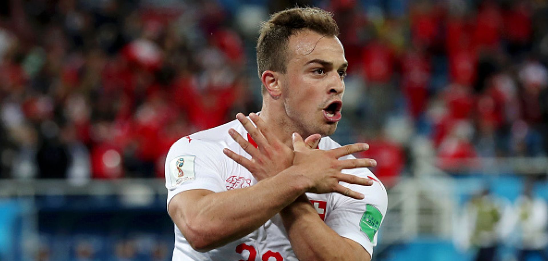 Swiss player Xherdan Shaqiri's celebration after scoring a World Cup goal against Serbia included flashing the Albanian eagle. Shaqiri was born in Kosovo, whose ethnic Albanian population fought a destructive conflict with Serbia in the 1990s.