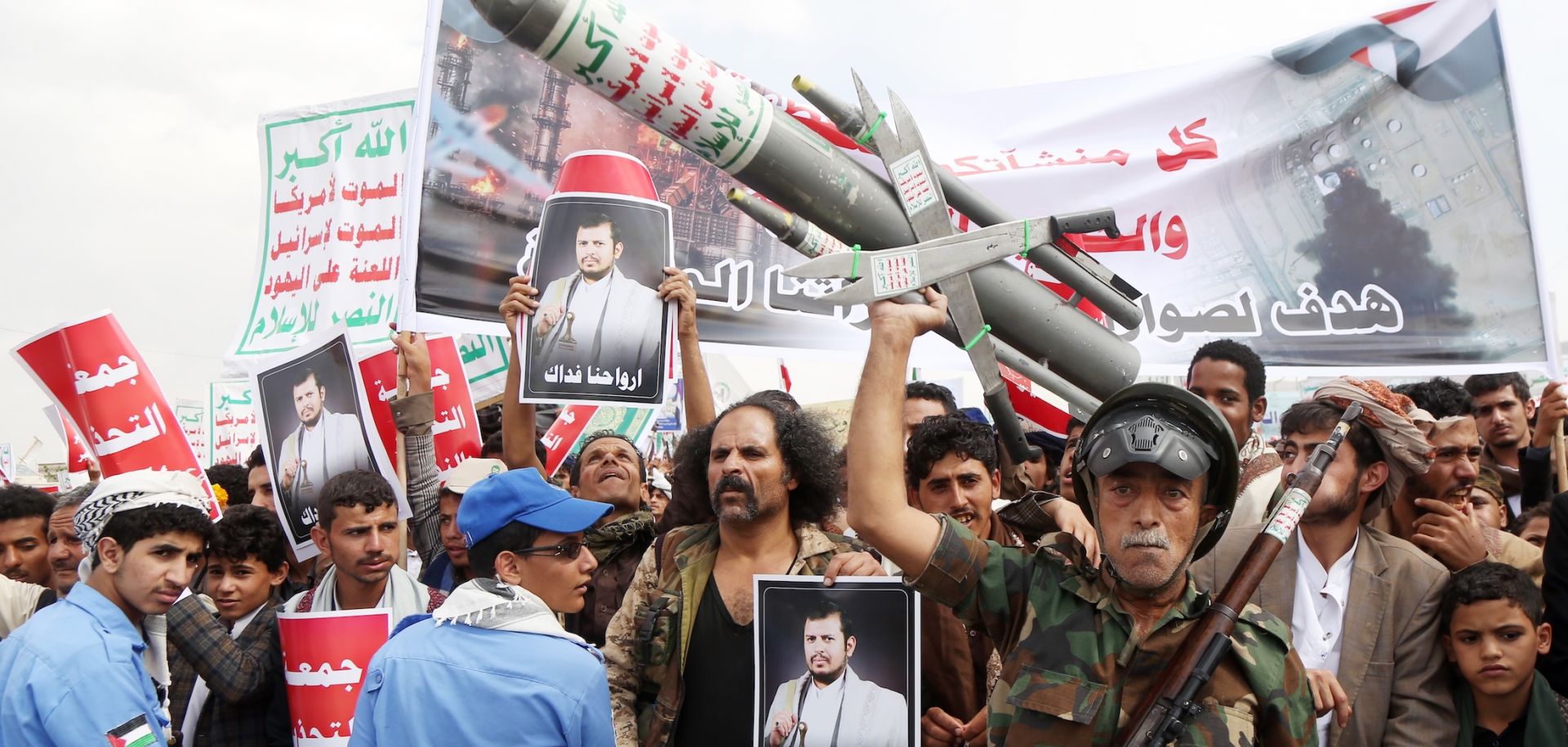 Yemeni protesters take part in a demonstration held to send a message of defiance against the continued siege and any military escalation involving Saudi forces against Houthi-controlled northern Yemen on July 17.