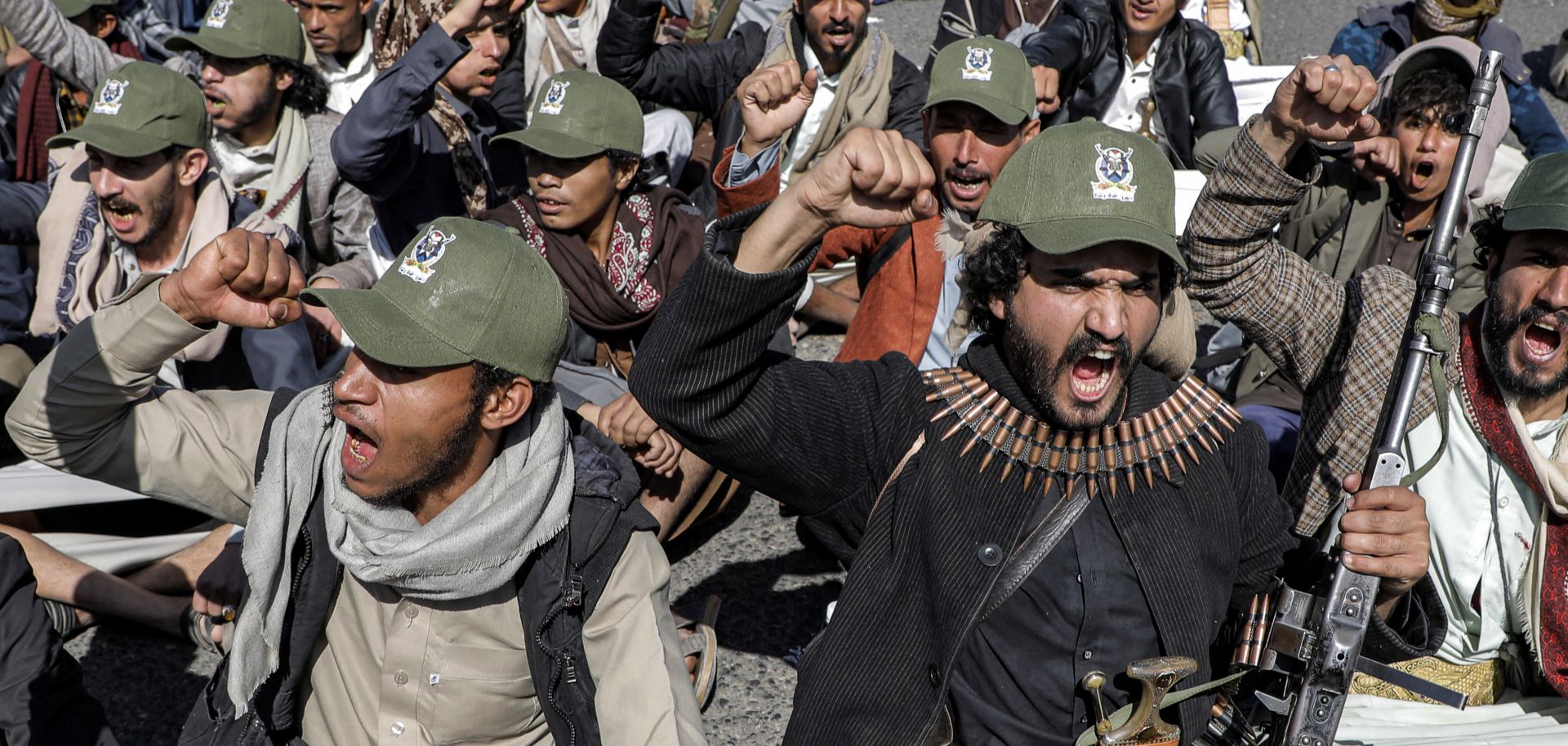 Fighters loyal to Yemen's Houthi group chant in Sanaa, Yemen, on Sept. 21, 2024, during a military parade marking the anniversary of the Houthis’ 2014 takeover of the capital.