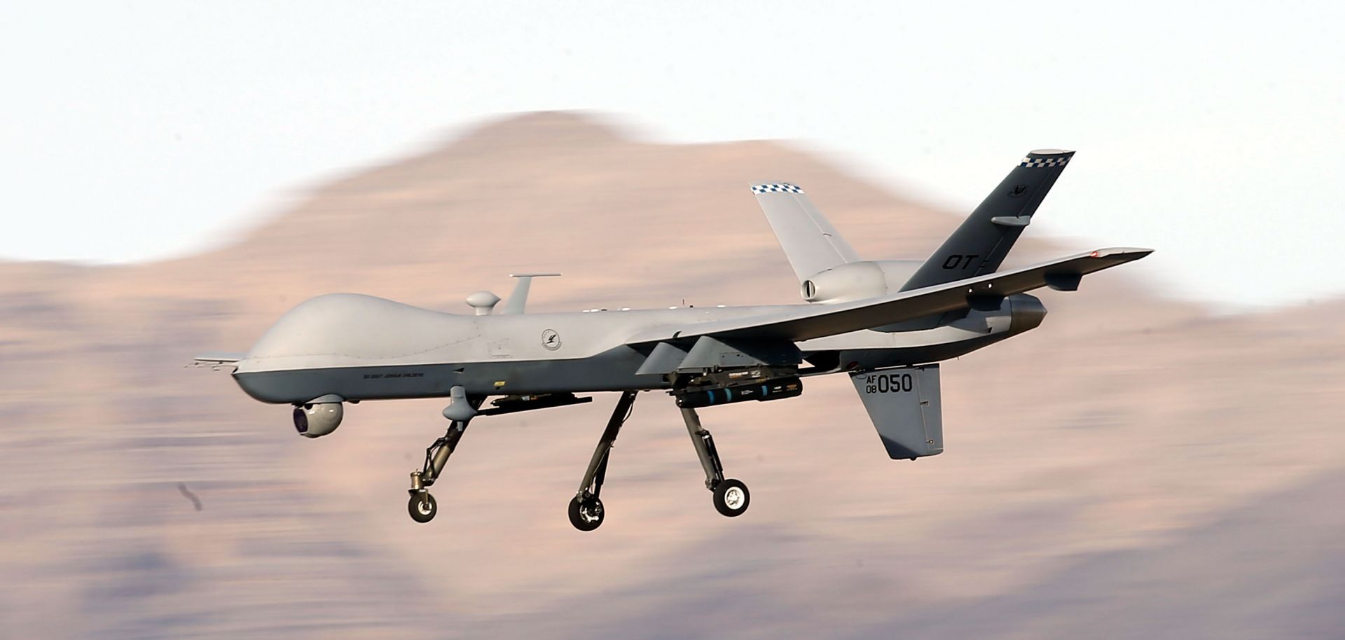 An MQ-9 Reaper remotely piloted aircraft (RPA) flies by during a training mission.