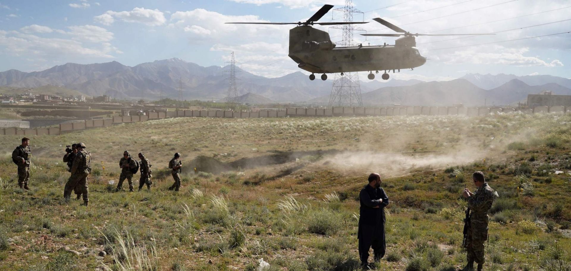 This photo shows a U.S. Chinook helicopter landing at a provincial capital in Afghanistan.
